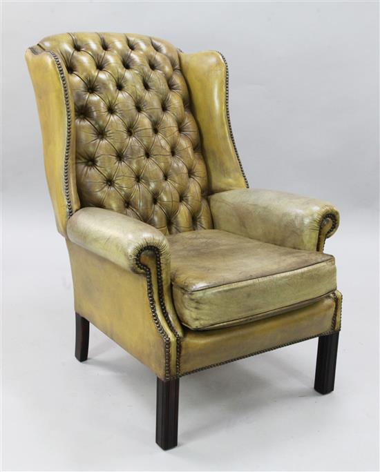 A George III style buttoned back armchair, H.3ft 4in.
